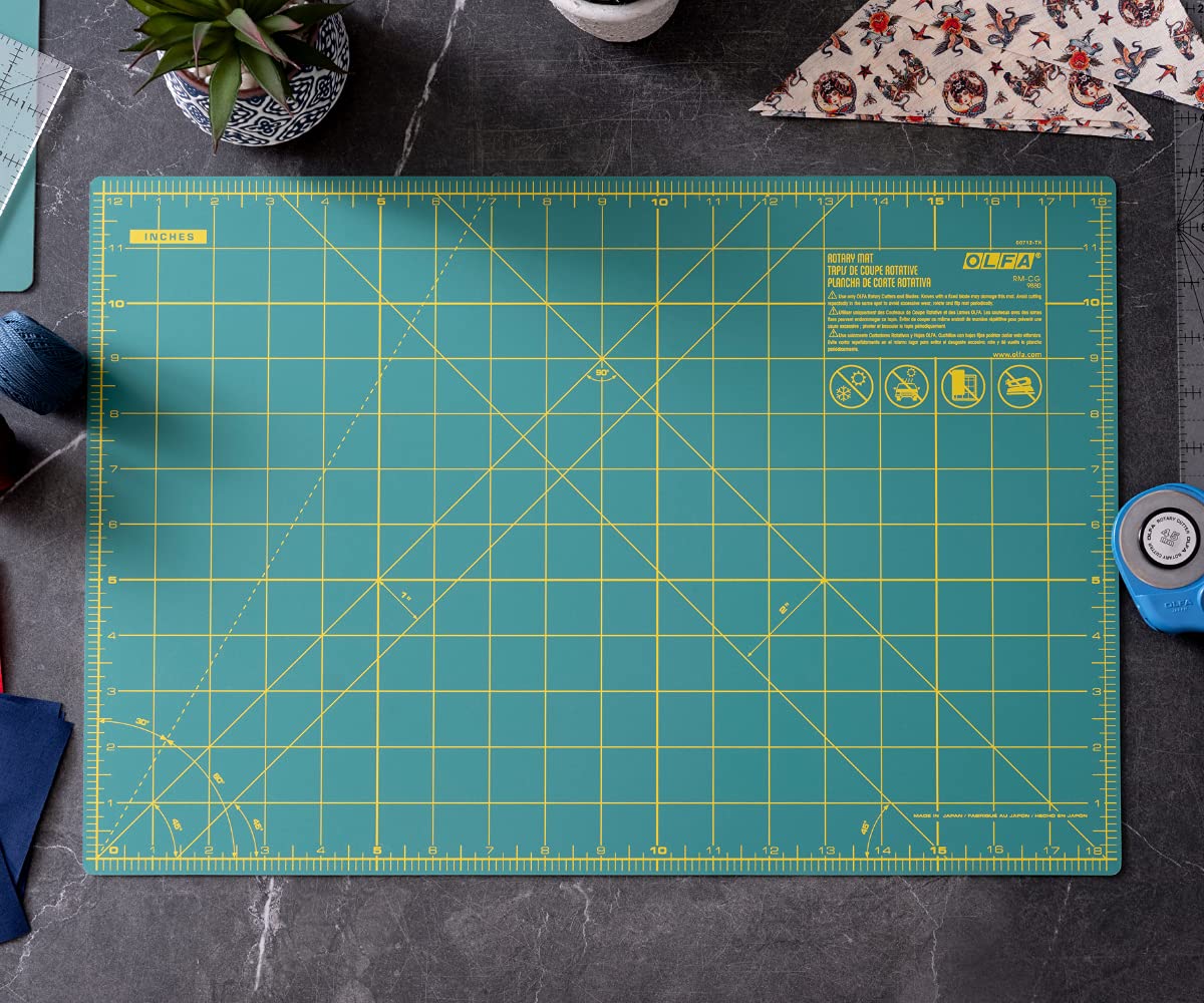 OLFA 12" x 18" Self Healing Rotary Cutting Mat (RM-CG) - Double Sided 12x18 Inch Cutting Mat with Grid for Quilting, Sewing, Fabric, & Crafts, Designed for Use with Rotary Cutters (Green) - Image 3