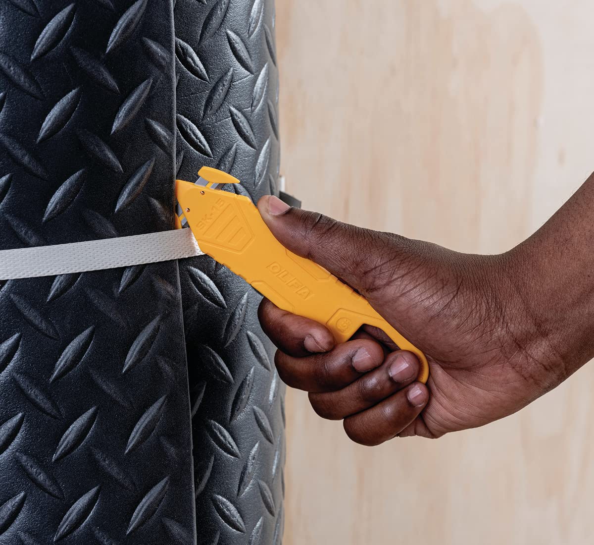 OLFA Disposable Concealed Blade Safety Knife, 10 Knives (SK-15/10) - Disposable Multi-Purpose Safety Box Cutter w/Concealed Blade, Tape Splitter, & Non-Slip Ergonomic Handle (10 Pack) - Image 4