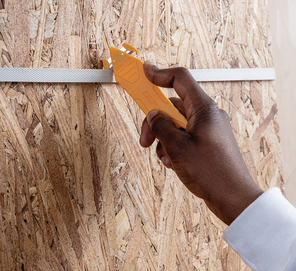 OLFA Disposable Concealed Blade Safety Knife, 10 Knives (SK-15/10) - Disposable Multi-Purpose Safety Box Cutter w/Concealed Blade, Tape Splitter, & Non-Slip Ergonomic Handle (10 Pack) - Image 5